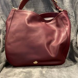 Brahmin large hobo bag. Magnetic closure. New without tags. Color wine